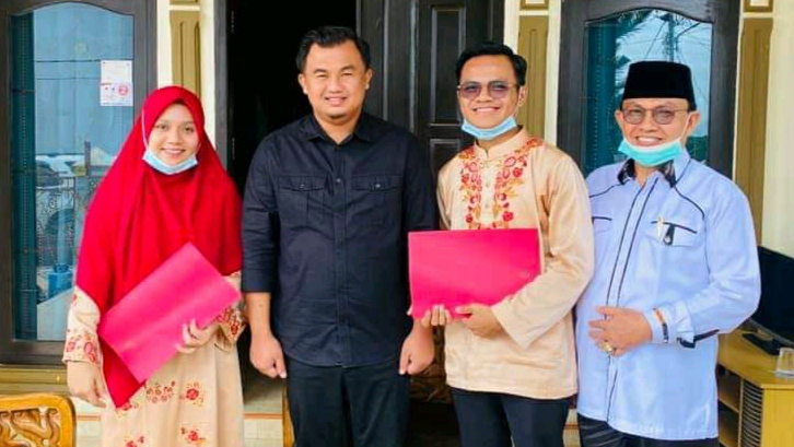 Berprestasi di MTQ Nasional, Asraldi dan Yunia Disambut di Dharmasraya