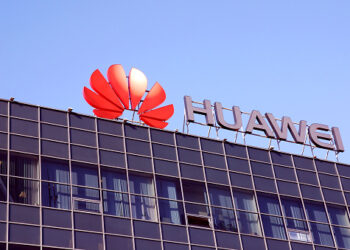 Moscow, Russia 30 August 2019 Huawei telecom company logo on office building  against clear blue sky