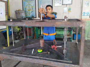 SMK Semen Padang Produksi Mesin Press Restorasi Arsip