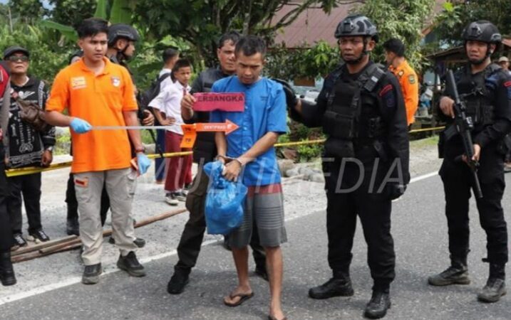 Indra Septiarman (26) alias In Dragon, tersangka utama dalam kasus pemerkosaan dan pembunuhan gadis penjual gorengan, Nia Kurnia Sari,