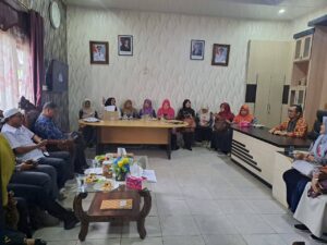 Kepala Dukcapil Dharmasraya, Ramilus, menandatangani Kesepakatan Kerja Sama Inovasi Pencatatan Golongan Darah